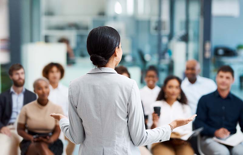 Woman speaking to an audience